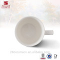 El blanco de cerámica al por mayor de China de la taza de café del drinkware, puede conseguir muestras libres